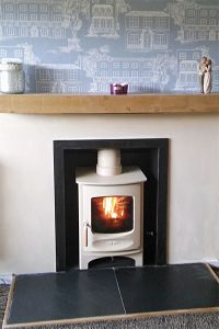 example of recessed stove installation in fireplace